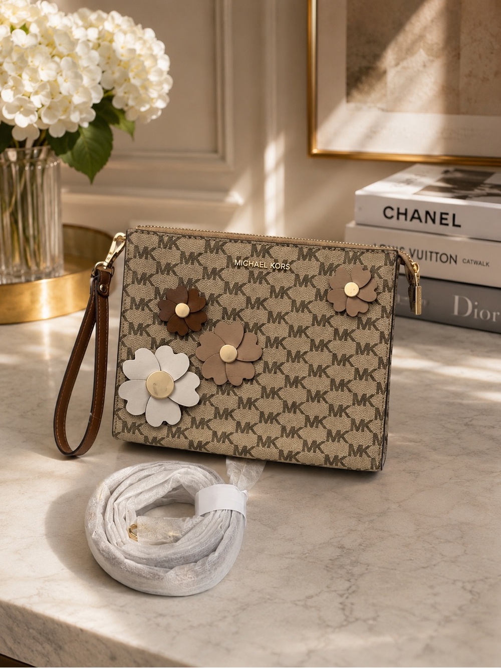 Michael Kors Beige and Brown Floral Crossbody and or wristlet.